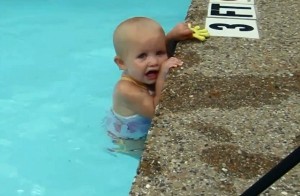 Baby-Swims-Across-Pool