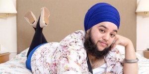 *** EXCLUSIVE *** SLOUGH - UNITED KINGDOM - UNDATED: Harnaam Kaur, 23, at her home in Slough, England. MEET the 23-year-old girl who?s growing a beard ? and says she feels more feminine than ever. Harnaam Kaur, from Slough, suffers with polycystic ovary syndrome, which causes excessive hair growth. She was just 11 years old when it started appearing and she spent her teenage years desperately trying to remove it by waxing TWICE a week and covering her body in baggy clothes. The primary school teaching assistant endured vile abuse at school and strangers would stare at her on the street. Harnaam became so self conscious she refused to leave her house, except to go to lessons, and at her lowest point she began self harming and even considered taking her own life. But, at the age of 16, she finally found the courage to accept her facial hair after being baptised as a Sikh. The religion dictates that the body should be left in its natural state and body hair must be left to grow. The decision proved controversial with her family but Harnaam was determined to show that she was beautiful no matter what she looked like. Today, seven years on, she says she is more body confident than ever before and hopes her story will help other women in her situation. UK Office, London. T +44 845 370 2233 W www.barcroftmedia.com USA Office, New York City. T +1 212 796 2458 W www.barcroftusa.com Indian Office, Delhi. T +91 11 4053 2429 W www.barcroftindia.com